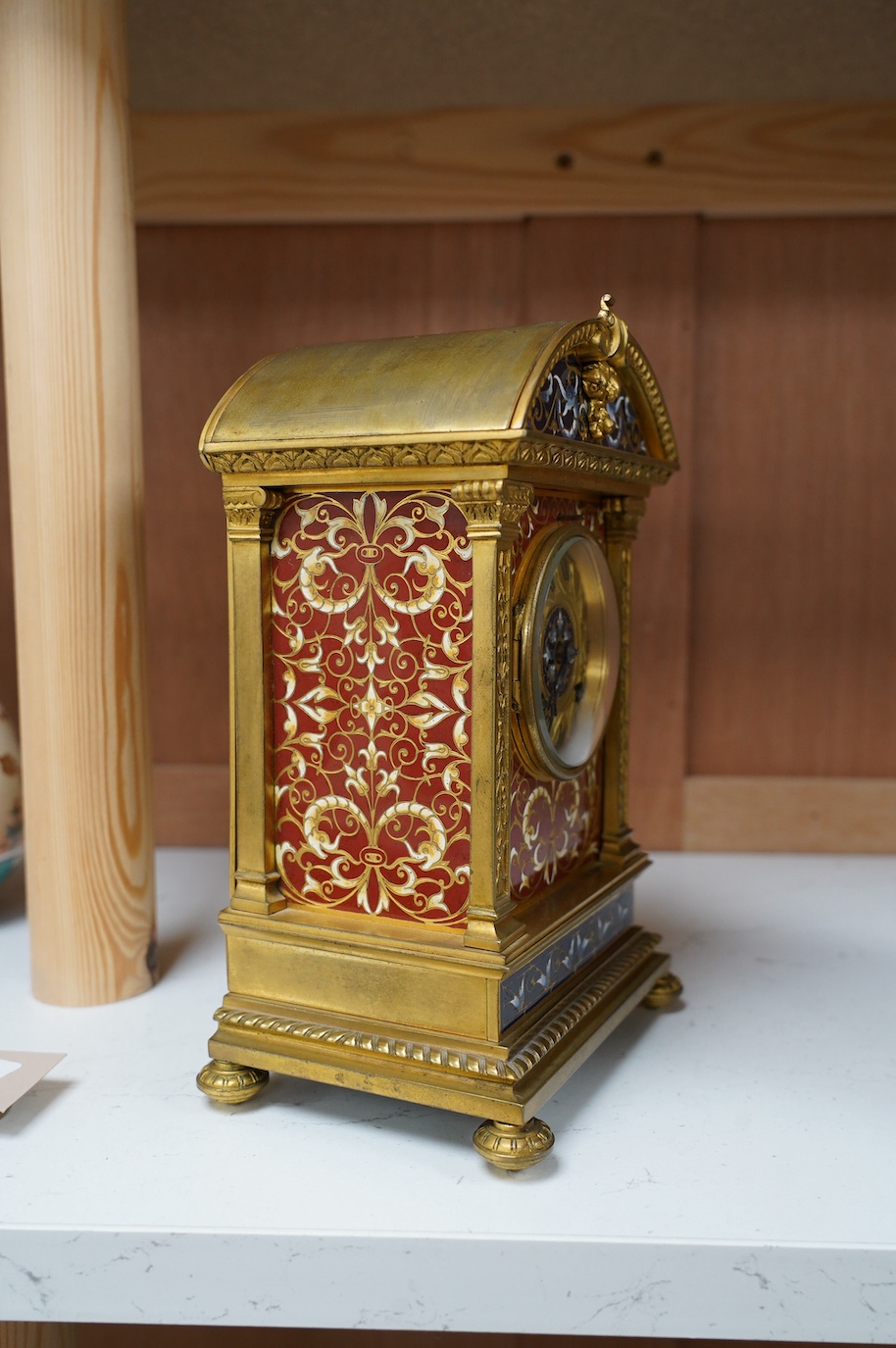 A late 19th century French champlevé enamel mantel clock, 22cm. Condition - good but with wear to dial, not tested as working